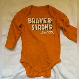 Cat and Jack 3-6 month orange onesie - brave and strong like mom